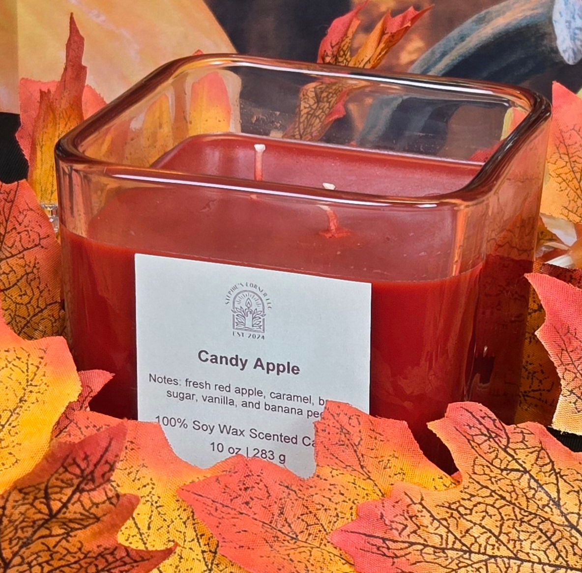 Candy Apple scented 100% soy candle in a 10 ounce glass cube jar.