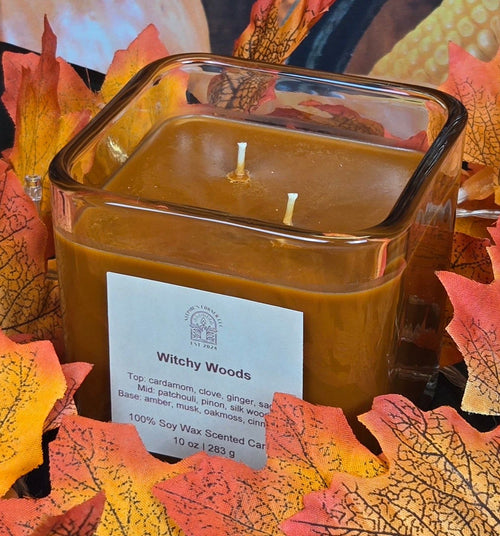 Witchy Woods scented 100% soy candle in a 10 ounce glass cube jar.