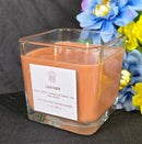Leather scented 100% soy candle in a 10 ounce glass cube jar.